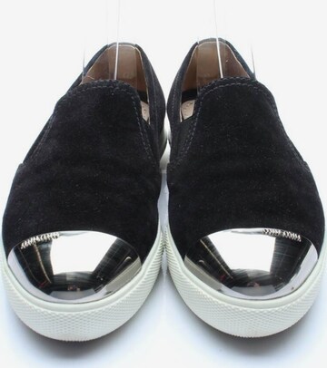 Miu Miu Flats & Loafers in 36 in Black