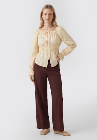 Usha - Blusa en amarillo
