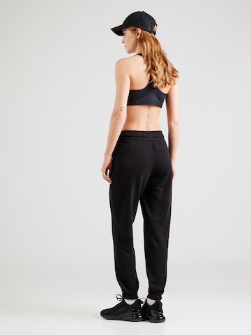 Tapered Pantaloni sportivi di 4F in nero