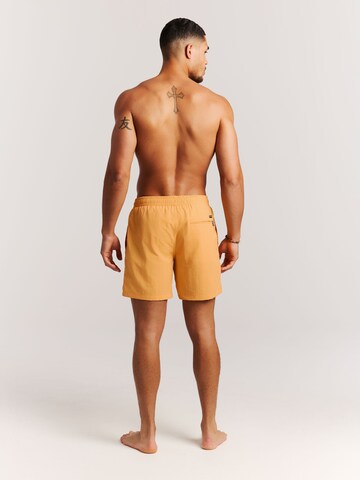 Shorts de bain 'Faster' PROTEST en jaune