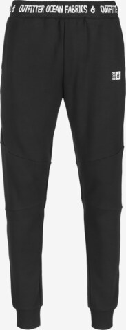 OUTFITTER Tapered Pants in Black: front