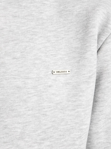 Veste de survêtement Smilodox en gris