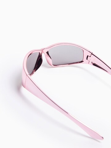 Lunettes de soleil Bershka en rose