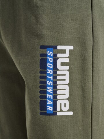 Effilé Pantalon 'TUKAS' Hummel en vert