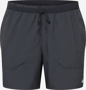 NIKE Обычный Спортивные штаны 'Flex Stride' в Черный: спереди