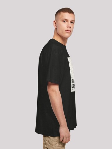 T-Shirt 'SELF CARE' F4NT4STIC en noir