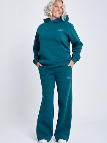 évasé Pantalon de sport 'Cotton Sweatpants' SPORTKIND en vert