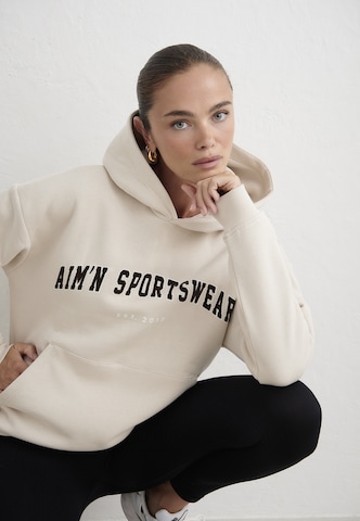 Sweat de sport Aim'n en beige