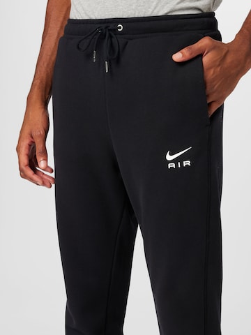 Nike SportswearTapered Hlače - crna boja