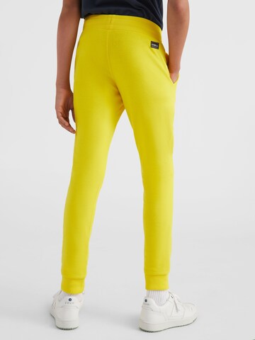 Tapered Pantaloni sportivi di O'NEILL in giallo