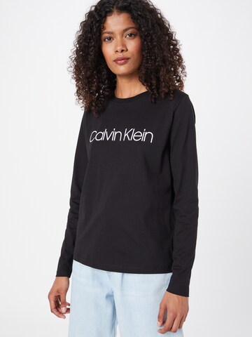 Calvin Klein - Camiseta en negro: frente