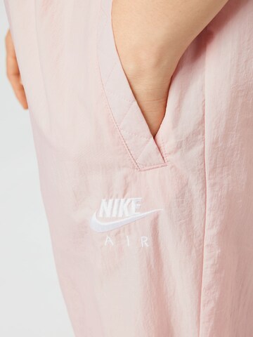 Loosefit Pantaloni sportivi di Nike Sportswear in rosa