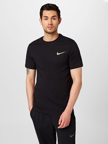 Nike Sportswear T-shirt i svart: framsida