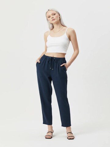 No Matter What Tapered Pleat-front trousers in Blue: front