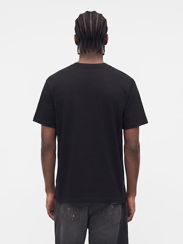 Carhartt WIP Μπλουζάκι 'Road Side Snack' σε μαύρο