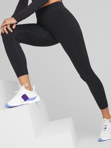 PUMA Skinny Sportbroek in Zwart: voorkant