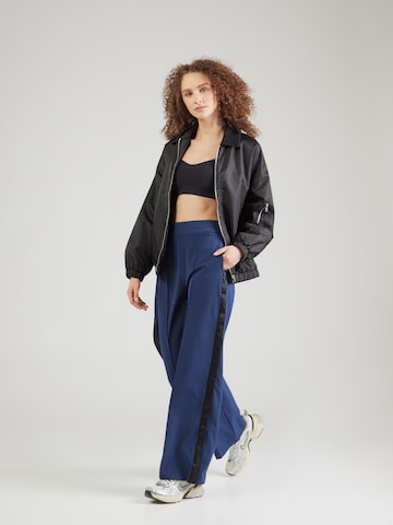 mėlyna NIKE Plačios klešnės Sportinės kelnės