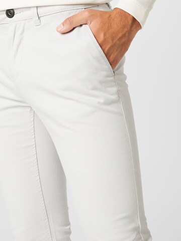 Coupe slim Pantalon chino TOM TAILOR en gris