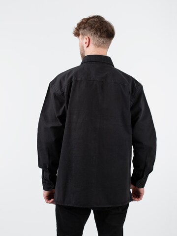 Carhartt WIP Jacke 'Reno' in Schwarz