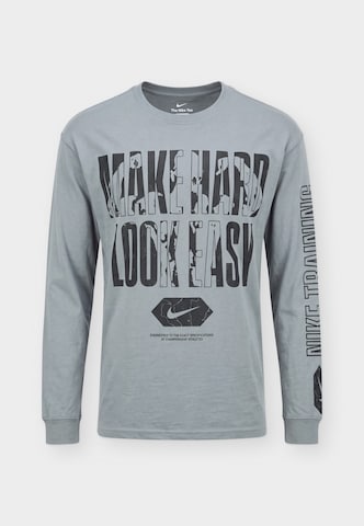 Maglia funzionale di NIKE in grigio: frontale