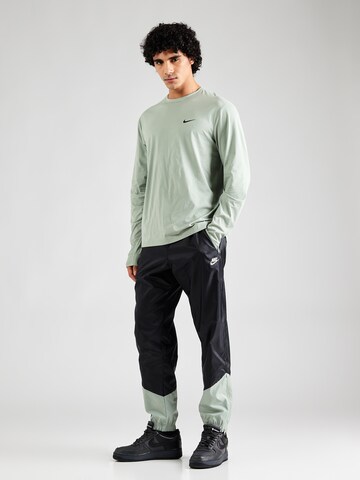 NIKE Performance shirt 'Hyverse' in Green