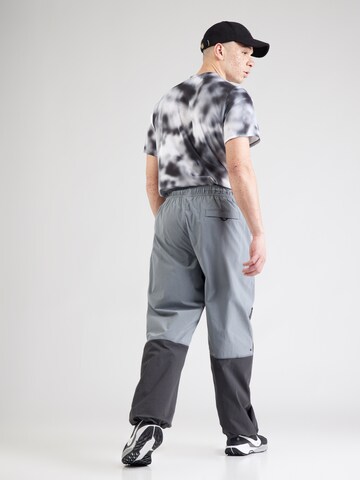 Nike Sportswear Tapered Παντελόνι 'Tech' σε γκρι