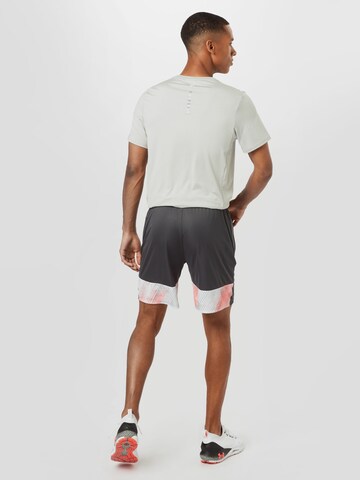 PUMA Regular Workout Pants in Grey