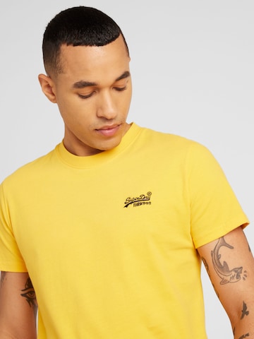 Superdry Koszulka w kolorze żółty