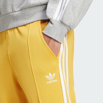 ADIDAS ORIGINALS Regular Broek 'Adicolor 70s' in Geel