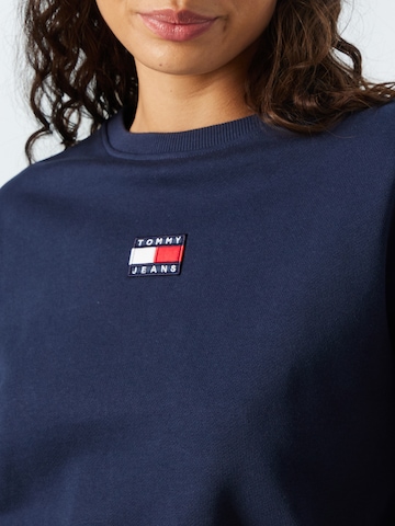 Tommy Jeans كنزة رياضية بلون أزرق