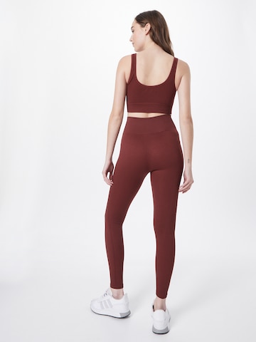 ABOUT YOU Skinny Sports trousers 'Kate' in Red