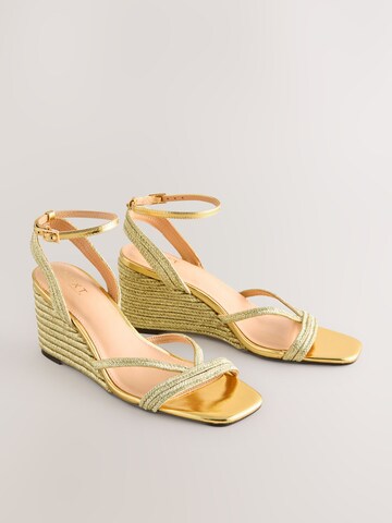 Next - Sandalias en oro