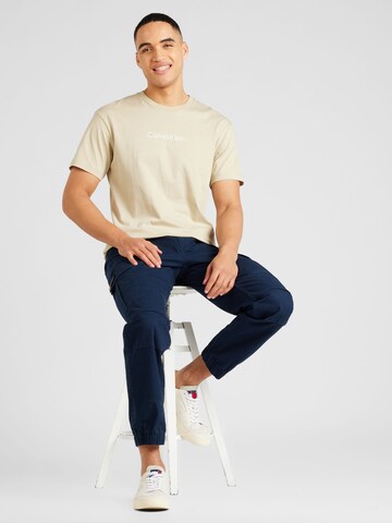 Effilé Pantalon cargo 'ETHAN' Tommy Jeans en bleu