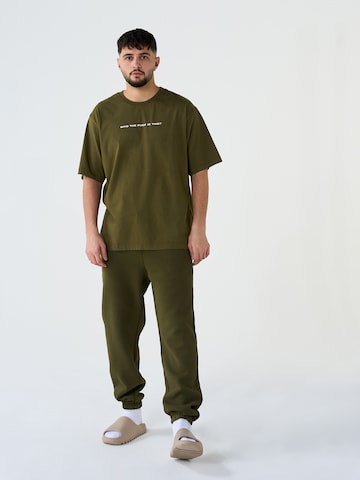 ABOUT YOU x Dardan Loose fit Pants 'Sammy' in Green