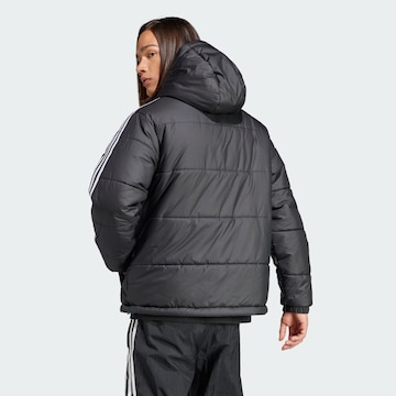 ADIDAS ORIGINALS Välikausitakki 'Adicolor' värissä musta