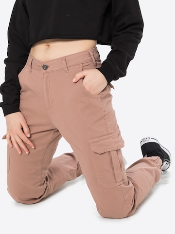 Effilé Pantalon cargo Urban Classics en beige