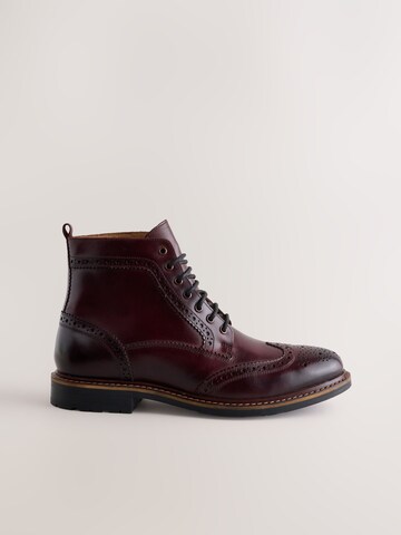 Boots stringati di Next in rosso