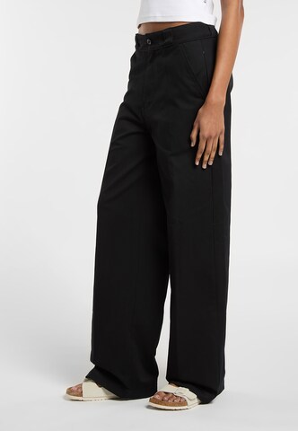 Effilé Pantalon DICKIES en noir : sur le côté
