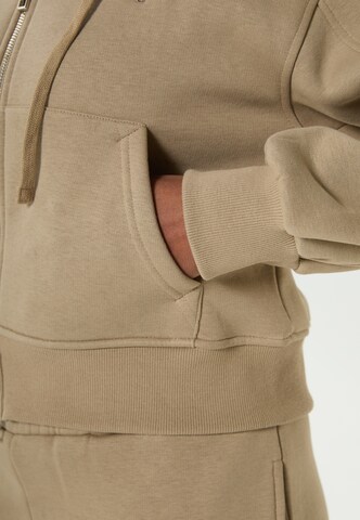 Tom Barron Joggingpak in Bruin