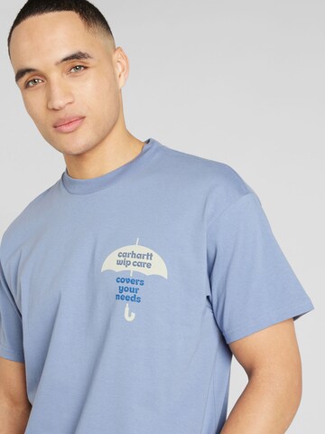 Carhartt WIP T-shirt 'Cover' i blå