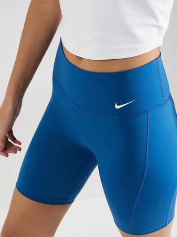 NIKESkinny Sportske hlače 'ONE' - plava boja