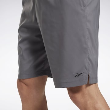 Reebok Normální Sportovní kalhoty – šedá