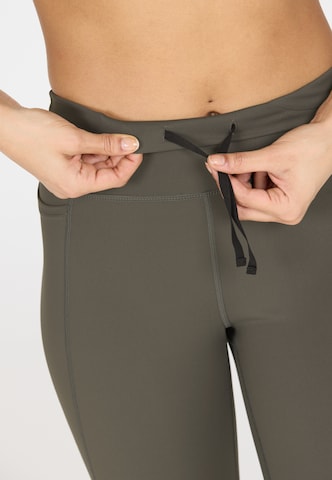 Athlecia Skinny Sportbroek 'Aliya' in Bruin