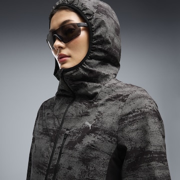 Veste de sport 'Run Brightstride' PUMA en noir