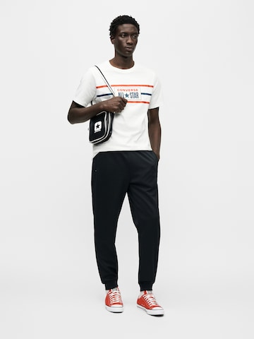Effilé Pantalon 'RETRO TRACK' CONVERSE en noir