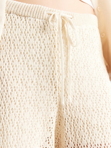 Loosefit Pantalon 'Lotti' ABOUT YOU en beige