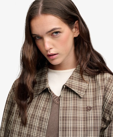 Superdry & Co Tussenjas in Bruin