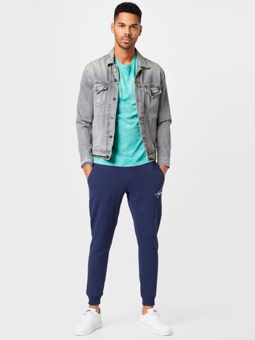 Tommy Jeans Tapered Hose in Blau