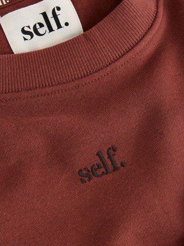 Sweat-shirt self. en marron
