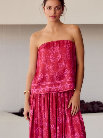 Haut Next en rouge : devant